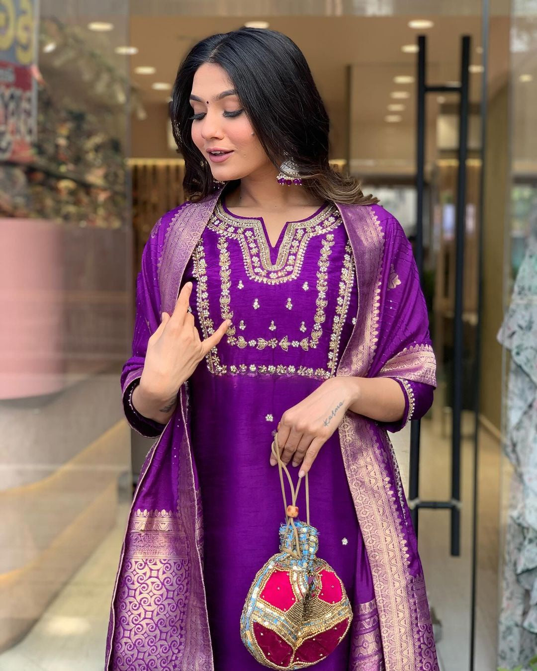 Saanvi - A serene design crafted for elegant occasions (Purple)