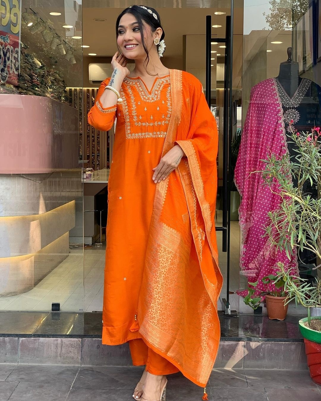 Saanvi - A serene design crafted for elegant occasions (Orange)