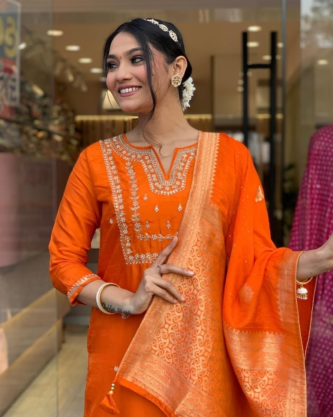 Saanvi - A serene design crafted for elegant occasions (Orange)