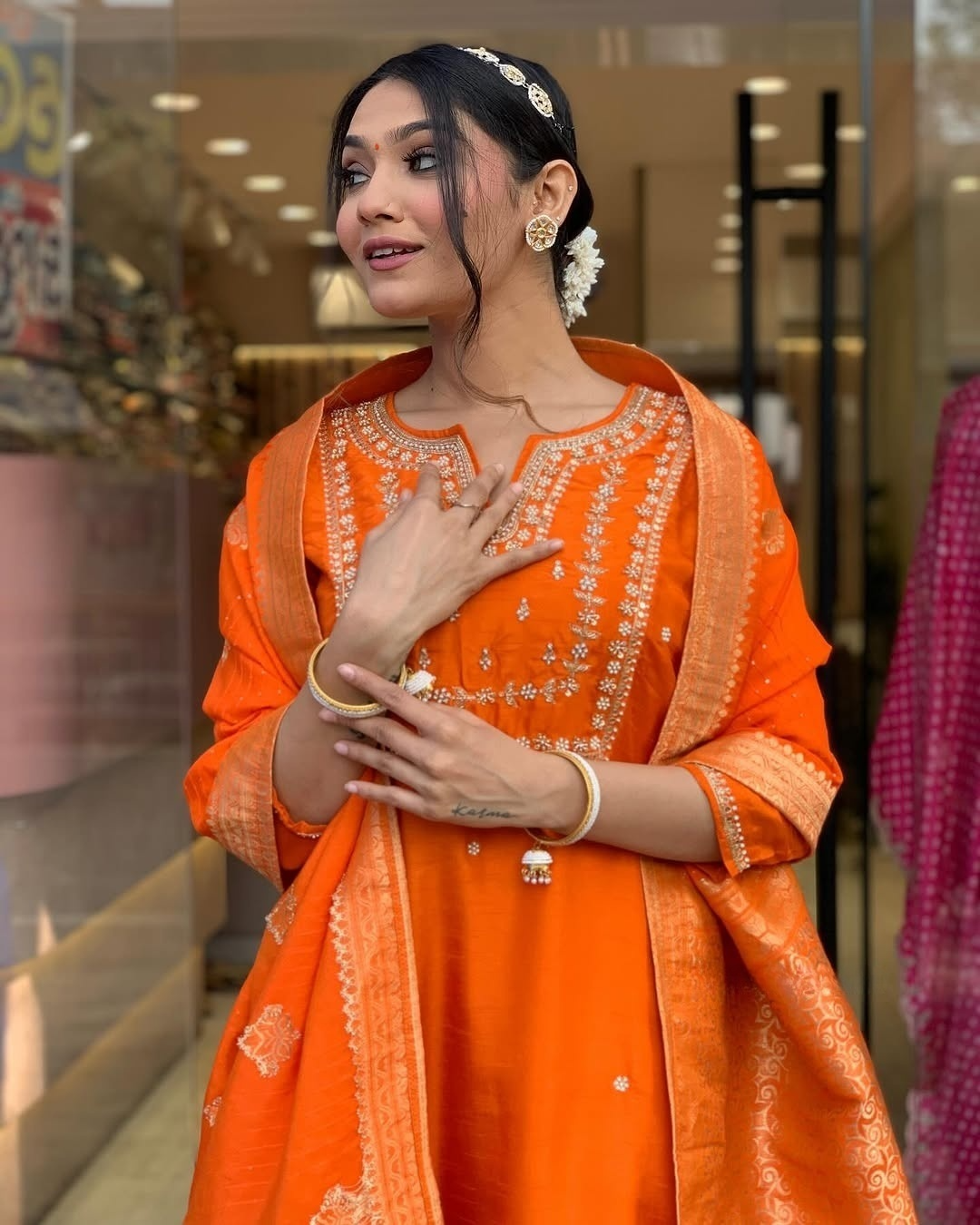Saanvi - A serene design crafted for elegant occasions (Orange)