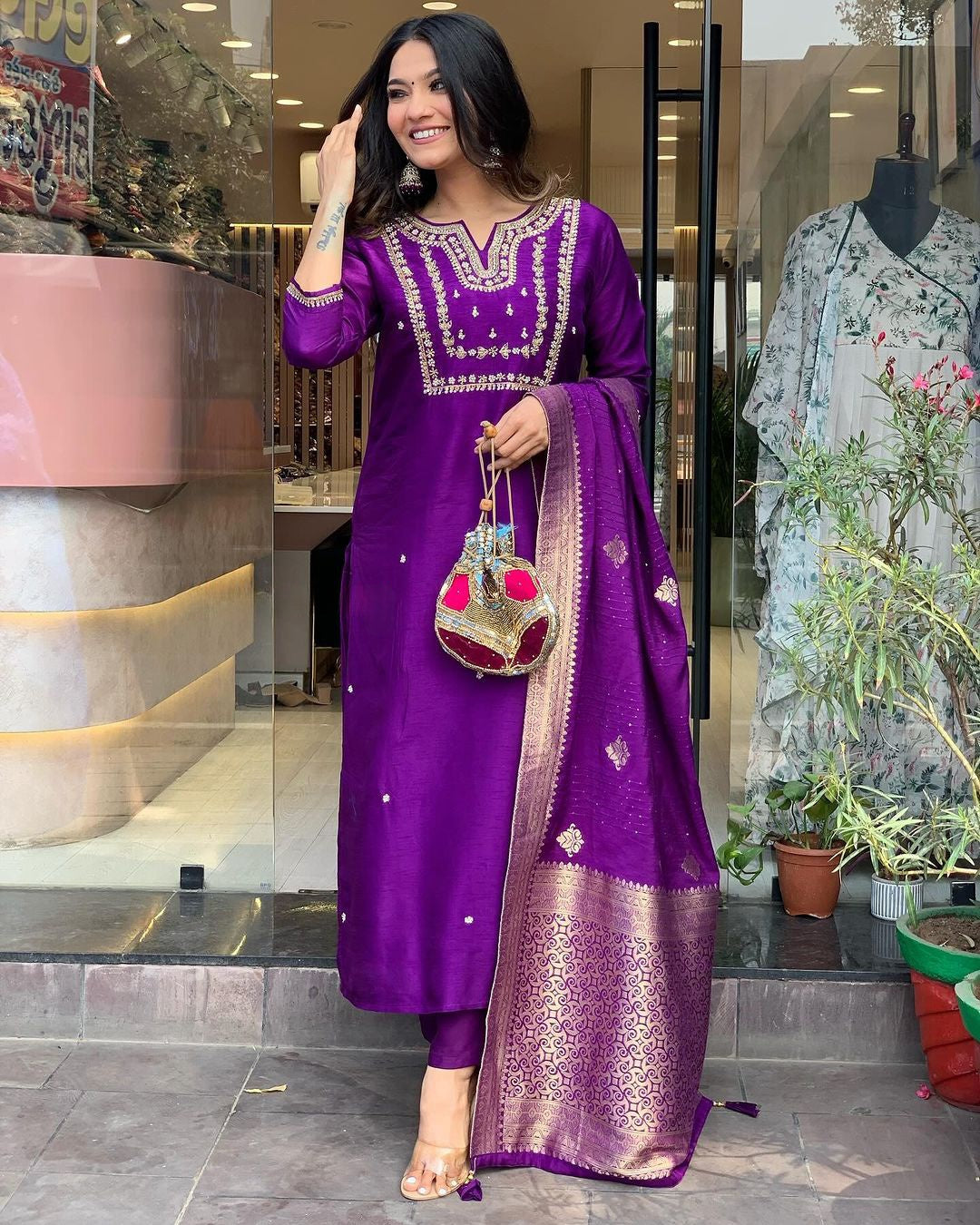 Saanvi - A serene design crafted for elegant occasions (Purple)