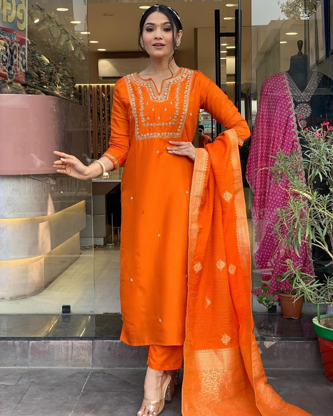 Saanvi - A serene design crafted for elegant occasions (Orange)