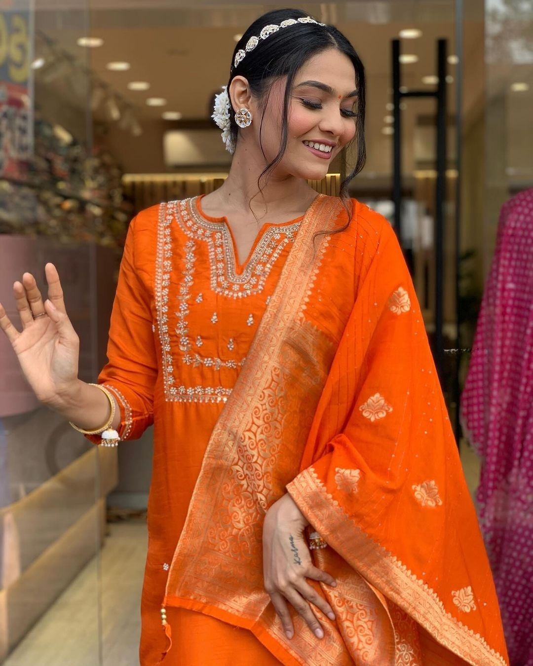 Saanvi - A serene design crafted for elegant occasions (Orange)